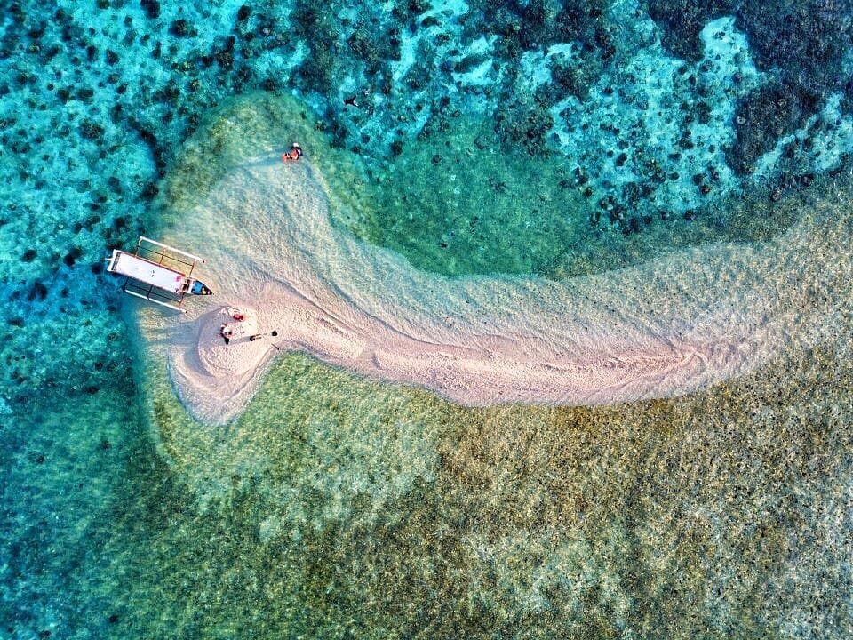Pulau pasir Tekat segele, Pulau Moyo